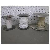3 partial spools of wire