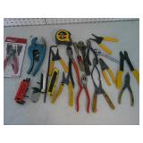 wire strippers, pliers, snap ring pliers