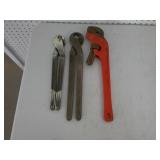 pipe wrench, pliers