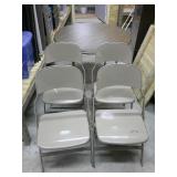 folding table and 4 metal chairs