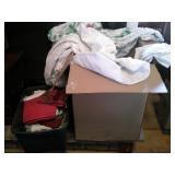 tote and box of linen, blankets, napkins