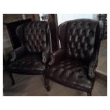 two faux leather chairs