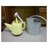 two watering cans
