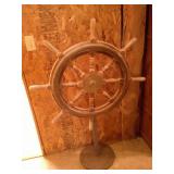 ships wheel on stand