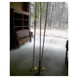 three flag poles, stands
