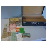 old papers, cigar box, luggage/case