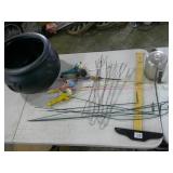 plastic cauldron, fishing poles