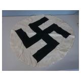 Swastika on white, cut from a flag