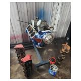 Chevy block on stand and various parts