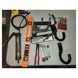 tow hooks, grease gun, level