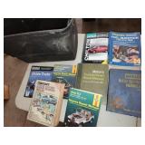 tote with various repair manuals