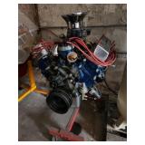 Incomplete Ford engine on stand