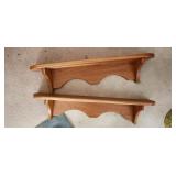 two small wooden shelves
