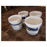 four plastic buckets