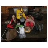 boat winch, rags, caulking gun, radio