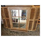 mirror with shutters