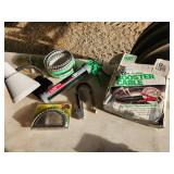 booster cables, caulking gun, turkey fan mount