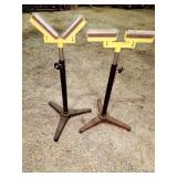 two adjustable roller stands