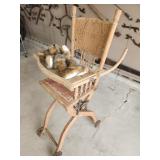 antique oak high chair/stroller with bear