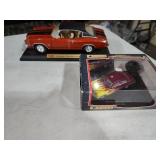 2 display cars (one is a mercury)