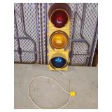 retired traffic light, wired to 110v
