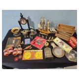 ship, ashtrays, cheese boxes, misc