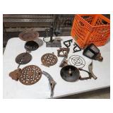 crate with cast iron pieces, bell, lamps