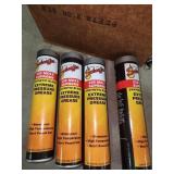 four grease cartridges