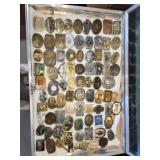 belt buckles in aluminum display case