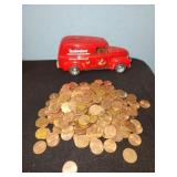Budweiser coin jar full of pennys