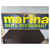wooden MARINA sign