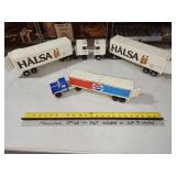 3 metal trucks and trailers