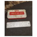 tin OFFICE sign, empty first aid tin