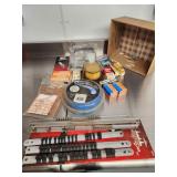 trimmer line, spark plugs, socket holders