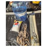 clothes pins, water jug, flag pole