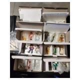 8 boxes of Oz figurines