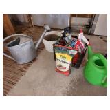 grass seed, water cans
