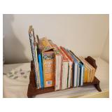 bookshelf, kids books and puzzles