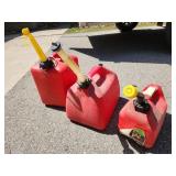 three gas cans