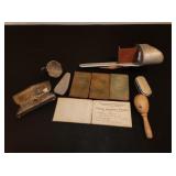 antique glasses, savings books, rattle