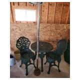 plastic table and chairs, with umbrella