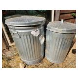 two garbage cans