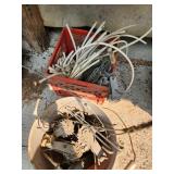 bucket and crate with fencing supplies