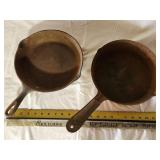 steel and cast pans