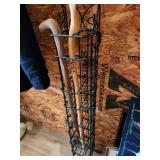 walking sticks and metal stand