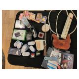mixing cup, tape measures, odds and  ends