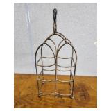 Decorative metal wine bottle holder