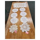 9 assorted doilies