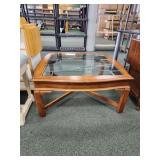 Vintage wooden frame glass top coffee table with