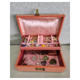 Vintage jewelry box with contents